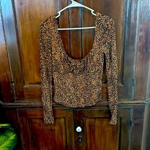 Free people long sleeve leopard ish print touched tee M